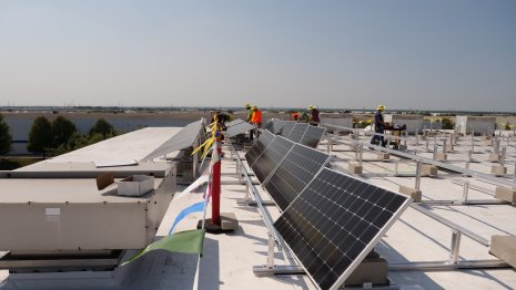 Installing the first solar panels at G&amp;W Electric headquarters