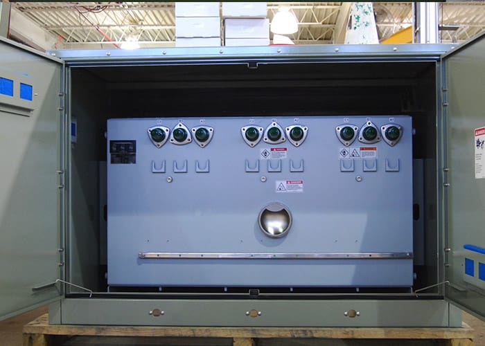 Grey switch inside a green container