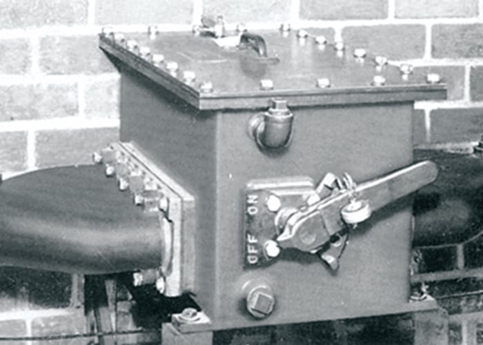 Black and white image of a manual oil switch