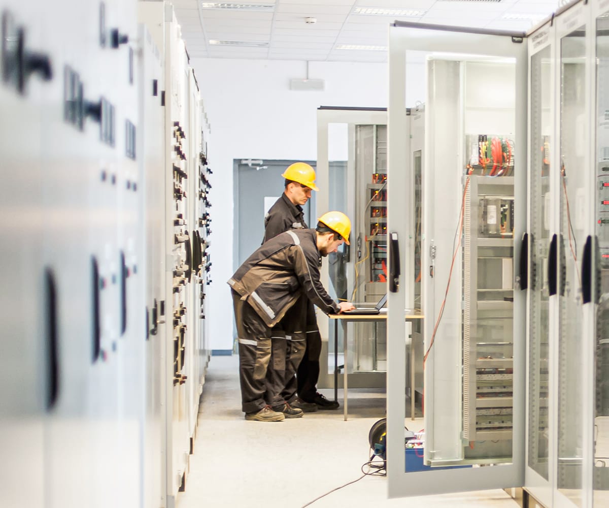 Men working in a data center